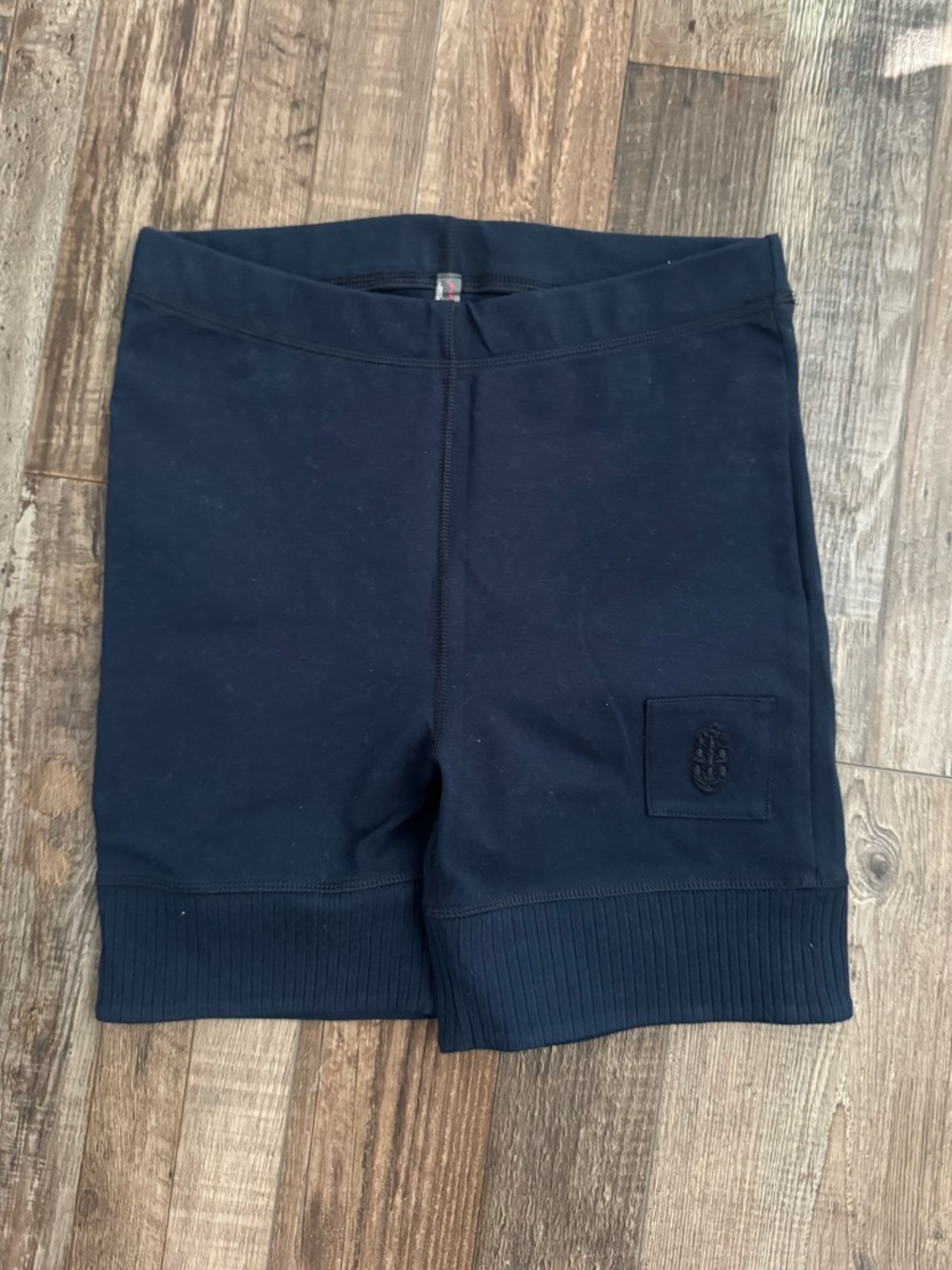 Navy blue free people biker shorts with logo